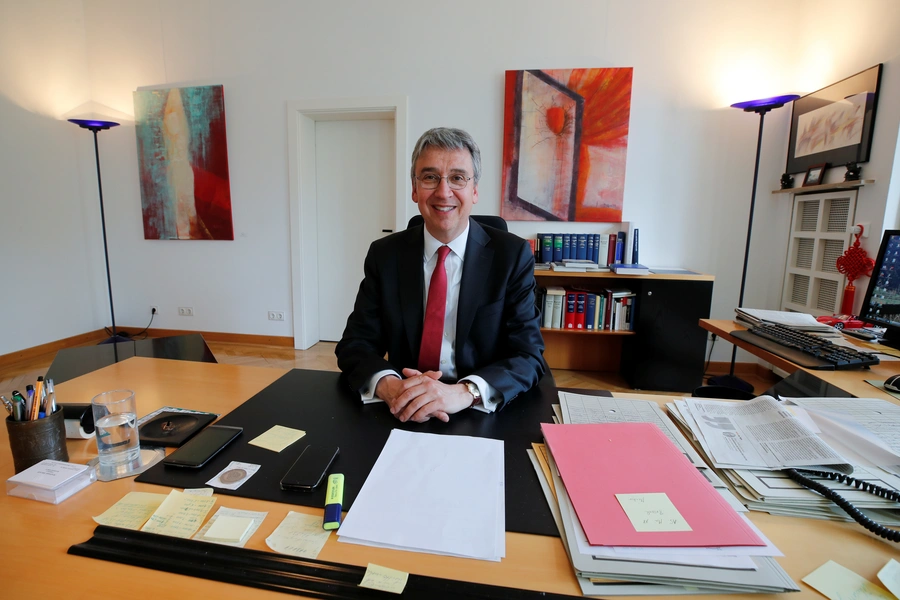 Andreas Mundt, president of Germany's Federal Cartel Office, is pictured at his desk before an interview with Reuters in Bonn, Germany April 17, 2018. Picture taken April 17, 2018. 