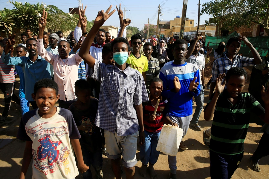 Sudanese demonstrators march during anti-government protests in Khartoum, Sudan, January 24, 2019. 