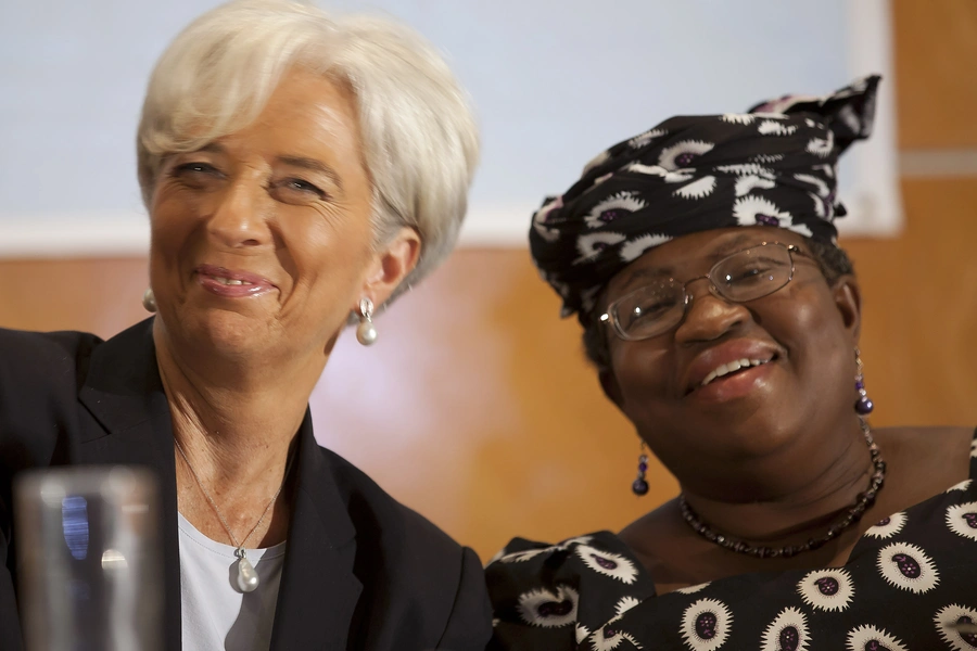 International Monetary Fund Managing Director Christine Lagarde speaks with Nigeria's Minister of Finance Ngozi Okonjo-Iweala during a conference on "Africa's Future: Responding to Today's Global Economic Challenges" in Lagos, December 20, 2011.