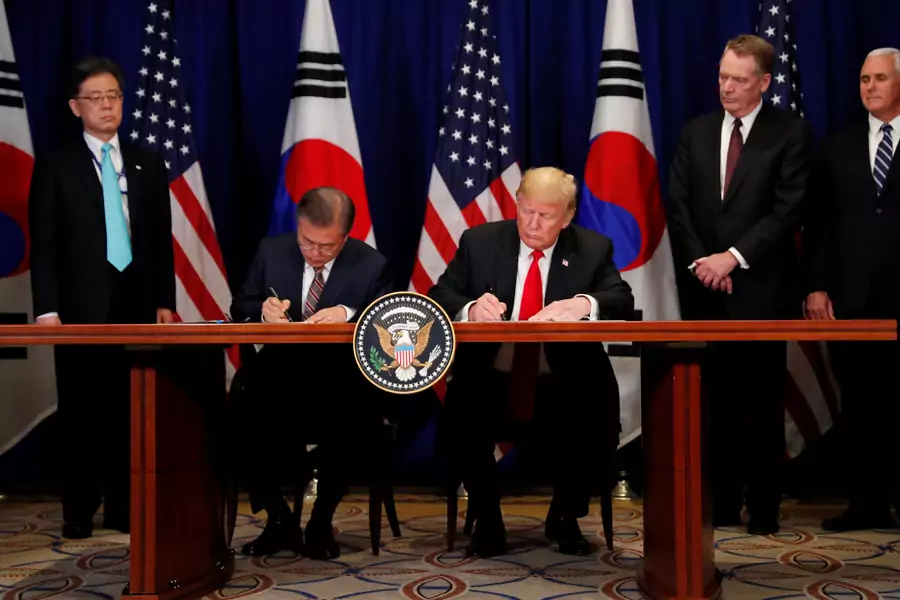U.S. President Donald Trump and South Korean President Moon Jae-in sign the U.S.-Korea Free Trade Agreement on the sidelines of the 73rd UN General Assembly on September 24, 2018.
