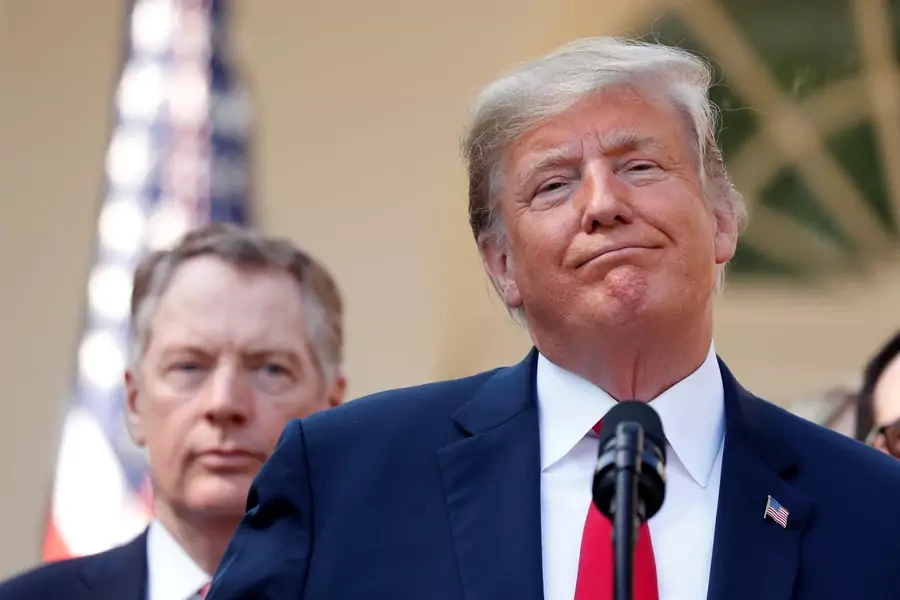 U.S. President Donald J. Trump stands with U.S. Trade Representative Robert Lighthizer as he delivers remarks on the United States-Mexico-Canada Agreement during a news conference in the White House Rose Garden in Washington, DC, October 1, 2018.