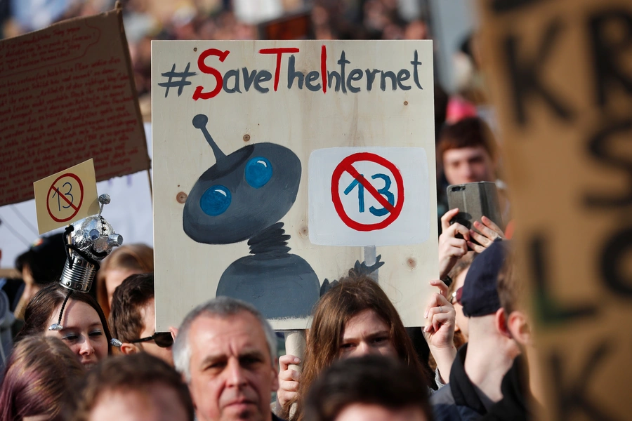 People protest against the planned EU copyright reform in Berlin, Germany March 23, 2019. 