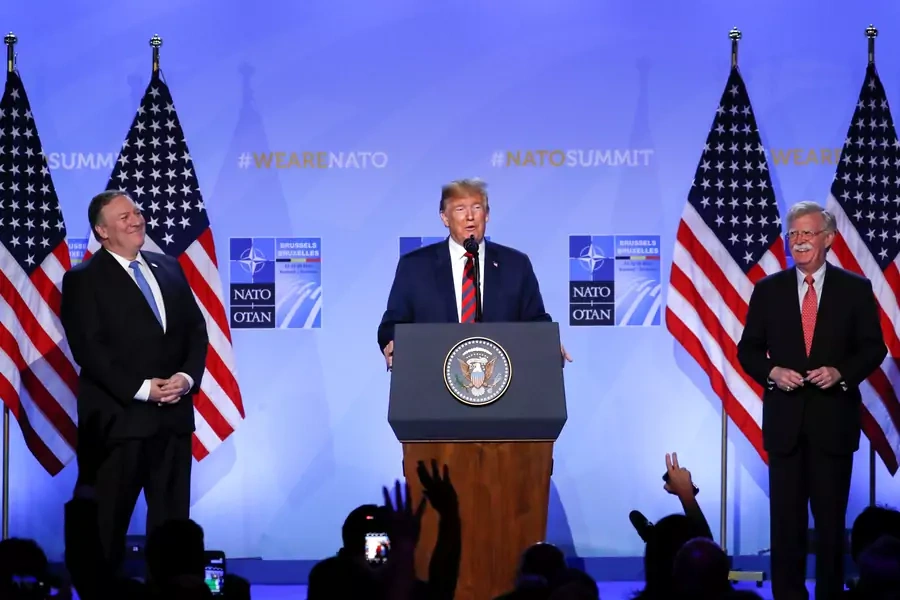U.S. President Donald J. Trump, Acting U.S. Secretary of State Mike Pompeo and U.S. National Security Adviser John Bolton hold a news conference after participating in the NATO Summit in Brussels, Belgium on July 12, 2018. 