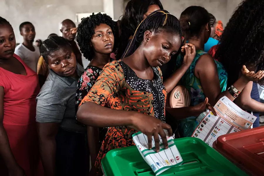  A woman casts her ballot as she votes in the presidential and parliamentary elections on February 23, 2019, at a polling station in Port Harcourt, southern Nigeria.