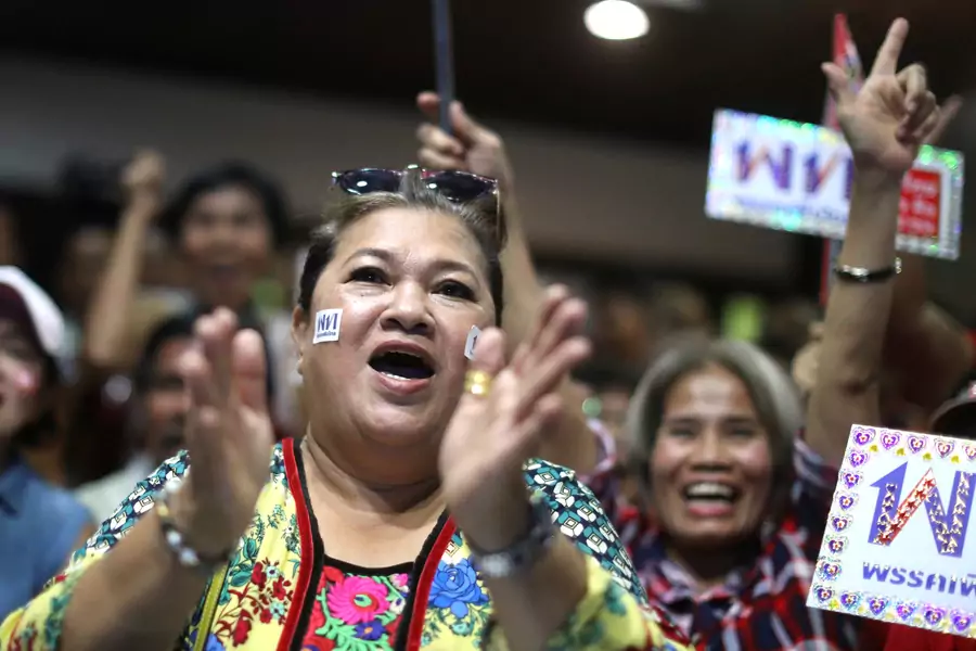 Supporters of Pheu Thai Party react after unofficial results, during the general election in Bangkok, Thailand, on March 24, 2019.