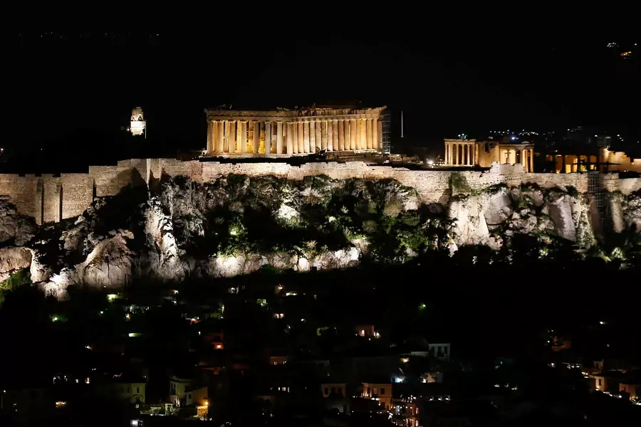 The ancient Parthenon temple is pictured atop the Acropolis hill before Earth Hour in Athens, Greece, on March 30, 2019.