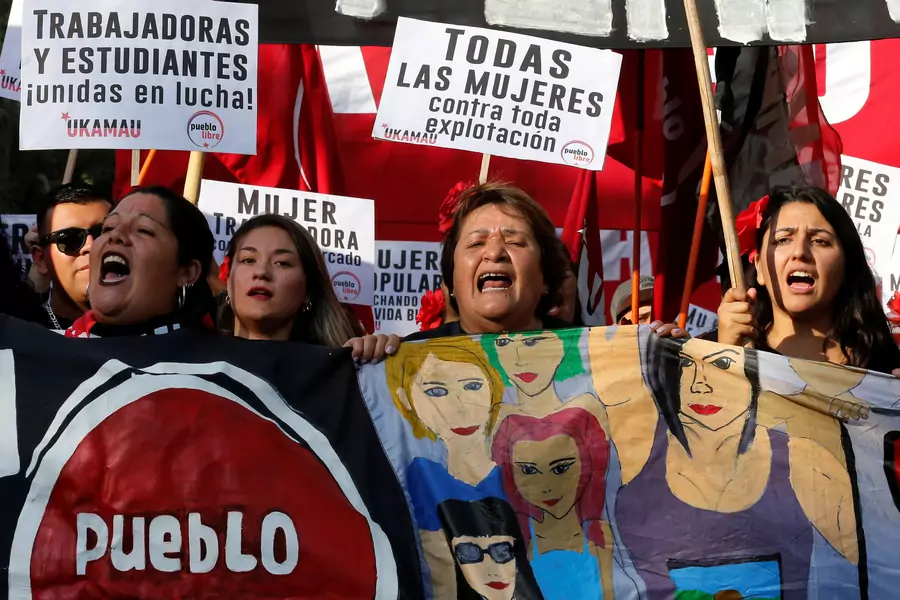 Women take part in a rally to mark International Women's Day in Santiago, Chile March 8, 2019.