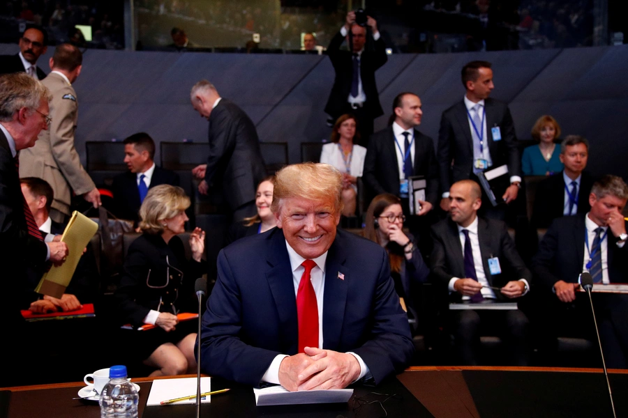 U.S. President Donald J. Trump attends a meeting of the North Atlantic Council during a NATO summit in Brussels, Belgium, July 11, 2018. 