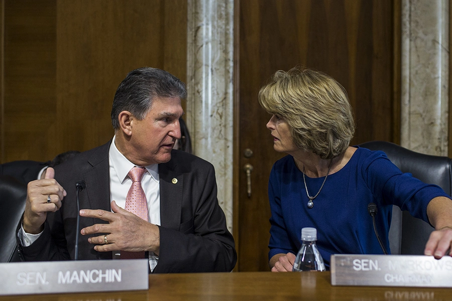 Senate Energy and Natural Resources Ranking Member Sen. Joe Manchin (D-WV) speaks to Senate Energy and Natural Resources Chairman Sen. Lisa Murkowski.