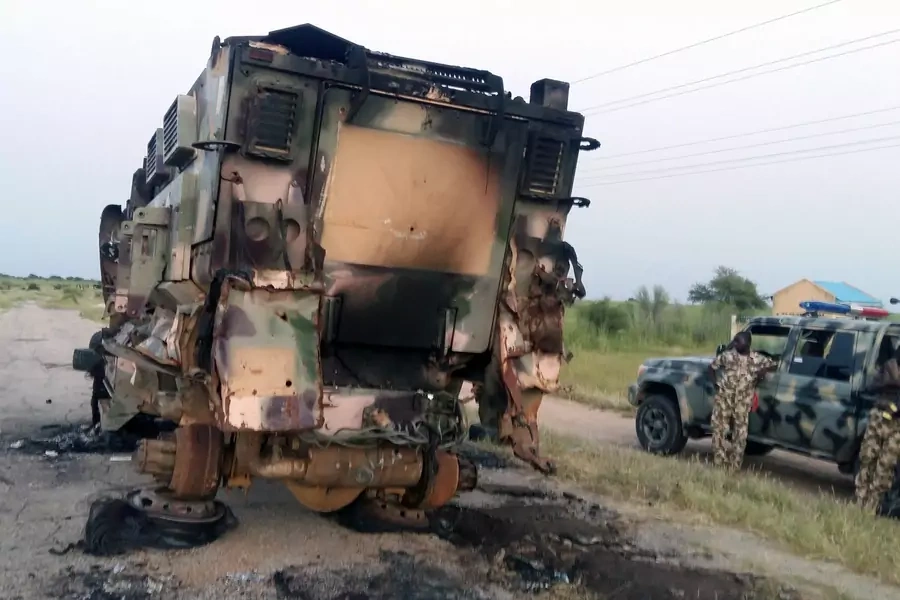 A damaged military vehicle is pictured in the northeast town of Gudumbali, after an attack by members of Islamic State in West Africa (ISWA), in Nigeria on September 11, 2018.