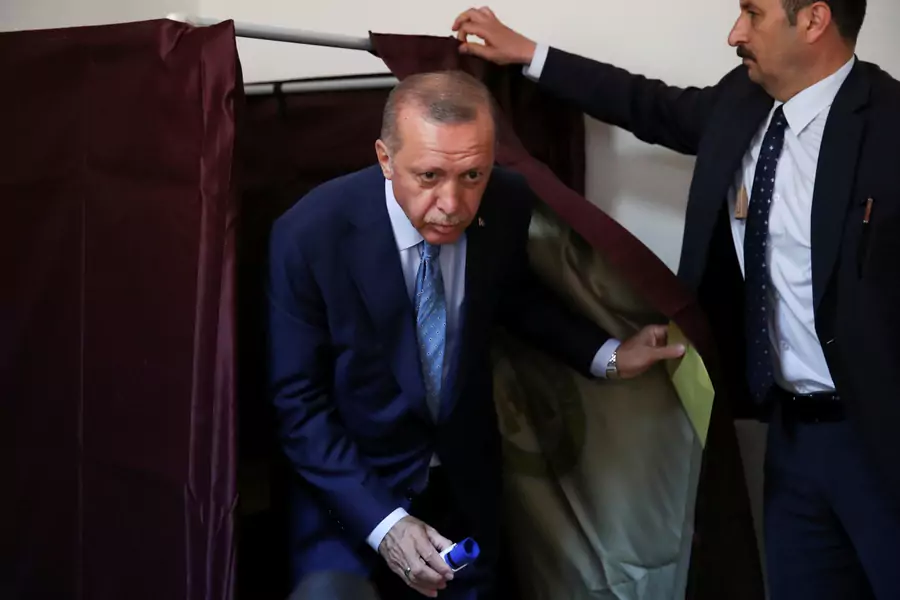 Turkish President Tayyip Erdogan leaves the voting booth at a polling station in Istanbul, Turkey June 24, 2018.