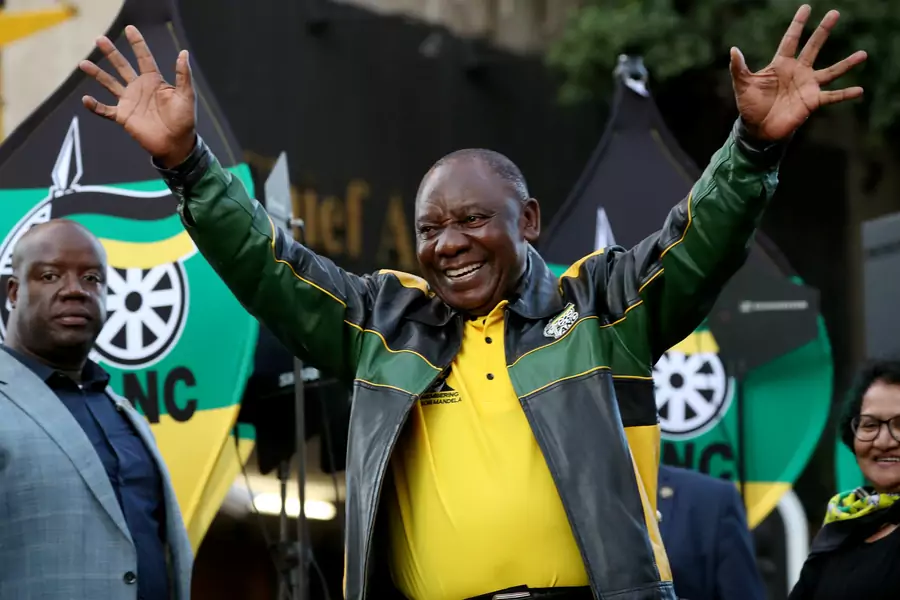 President Cyril Ramaphosa waves to supporters of his ruling African National Congress (ANC) at an election victory rally in Johannesburg, South Africa, on May 12, 2019.