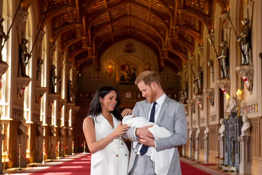 Britain's Prince Harry and Meghan, duchess of Sussex, are seen with their baby son, who was born on Monday morning, during a photocall in St George's Hall at Windsor Castle, in Berkshire, Britain May 8, 2019.