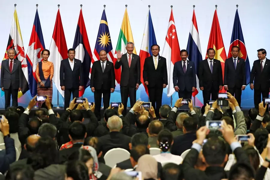 ASEAN leaders gather for a group photo during the opening ceremony of the 33rd ASEAN Summit in Singapore on November 13, 2018.