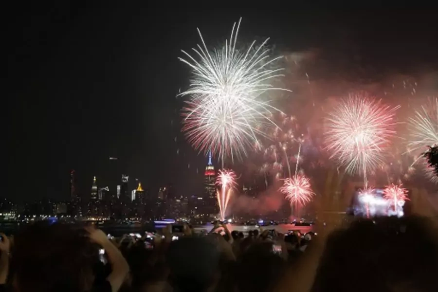 People gather to watch fireworks at the East River State Park in Williamsburg, Brooklyn. 