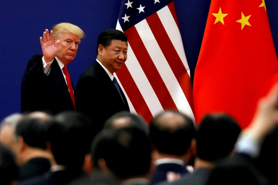 U.S. President Donald J. Trump and China's President Xi Jinping meet business leaders at the Great Hall of the People in Beijing, China, on November 9, 2017.