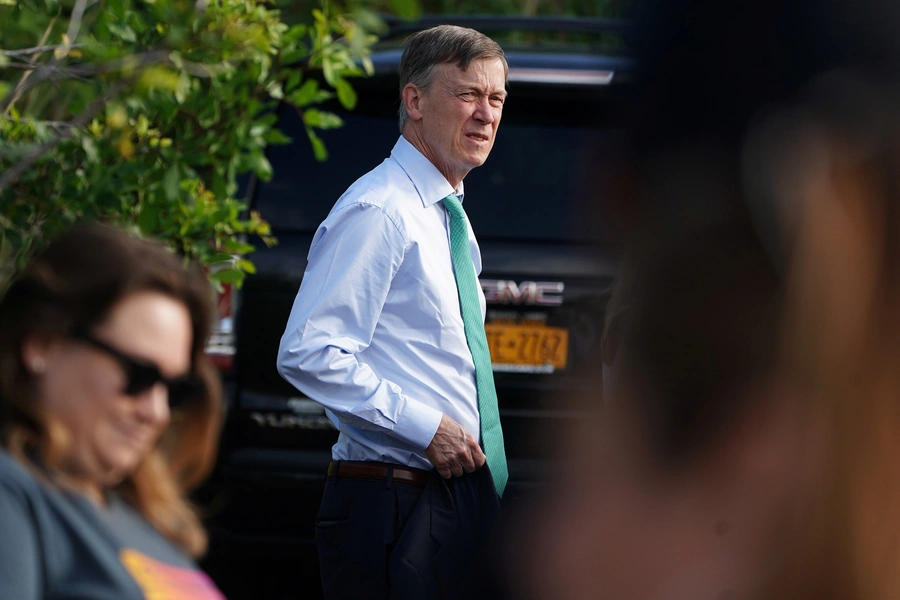 John Hickenlooper arrives at a detention facility for youths incarcerated in Homestead, Florida. Carlo Allegri/REUTERS 