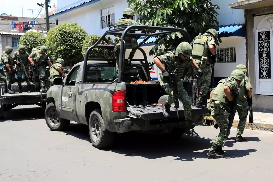 Members of the National Guard patrol around the neighborhoods in the Iztapalapa borough of Mexico City, Mexico July 5, 2019