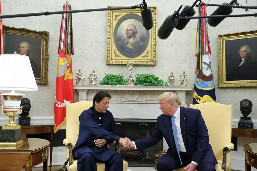 Pakistan’s Prime Minister Imran Khan shakes hands with U.S. President Donald J. Trump at the start of their meeting in the Oval Office of the White House in Washington, U.S., on July 22, 2019. 