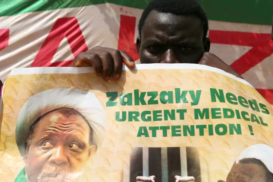 A protester holds a banner calling for the release of Sheikh Ibrahim Zakzaky, the leader of the Islamic Movement of Nigeria (IMN), in Abuja, Nigeria, on January 26, 2018. 