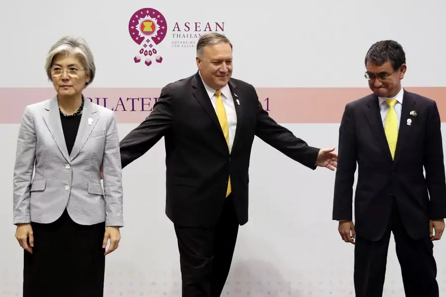 U.S. Secretary of State Mike Pompeo poses with Japanese counterpart Taro Kono and South Korean counterpart Kang Kyung-wha after a meeting on the sidelines of the ASEAN and dialogue partners foreign ministers' meeting in Bangkok, Thailand August 2, 2019.