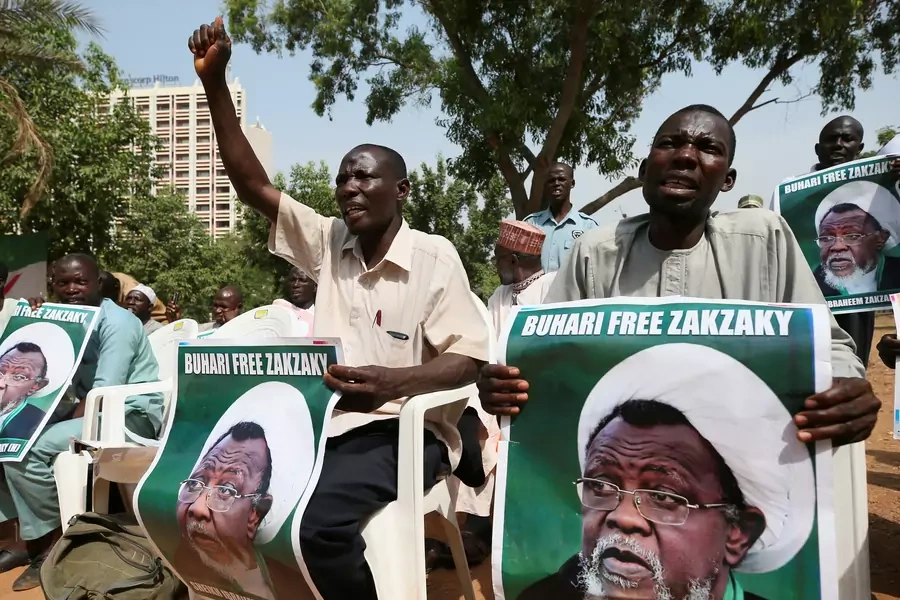 Protesters hold banners calling for the release of Sheikh Ibrahim Zakzaky, the leader of the Islamic Movement of Nigeria (IMN), in Abuja, Nigeria, on January 26, 2018.