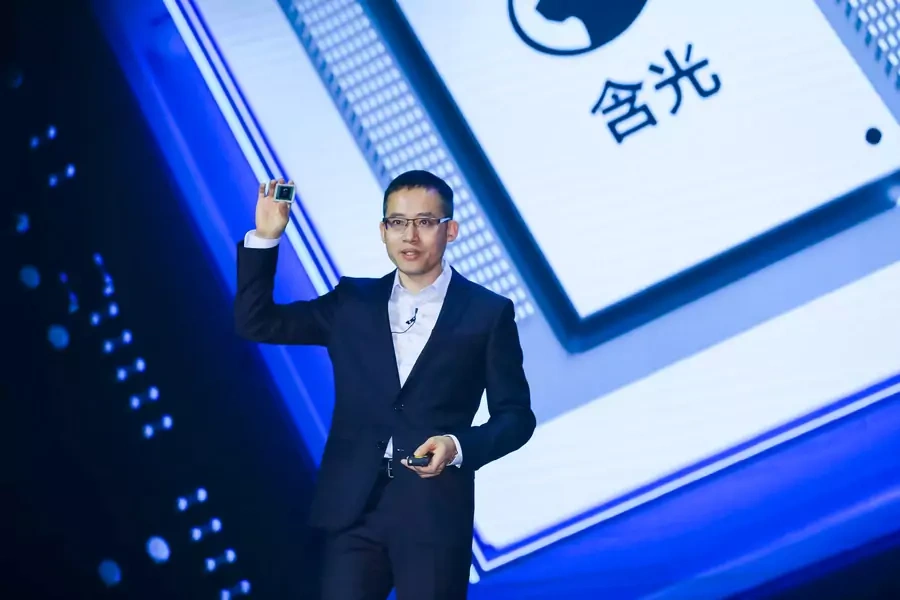 Alibaba's Chief Technology Officer (CTO) Jeff Zhang holds a new self-developed AI chip Hanguang 800 at the Alibaba Cloud Computing Conference in Yunqi of Hangzhou, Zhejiang province, China September 25, 2019.