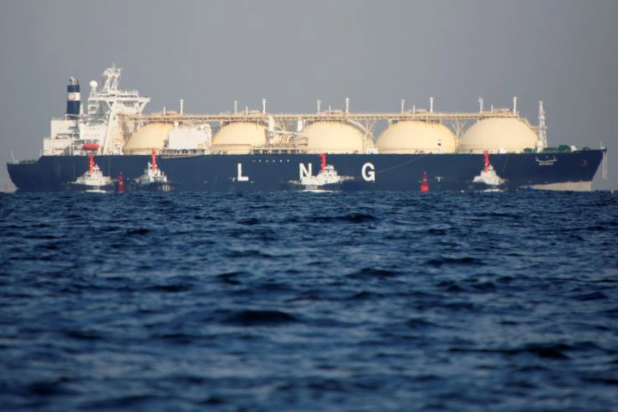 A liquefied natural gas (LNG) tanker is tugged towards a thermal power station in Futtsu, east of Tokyo, Japan, on November 13, 2017.