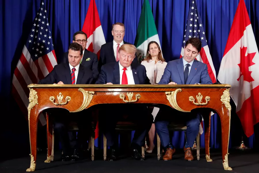 U.S. President Donald Trump, Canada's Prime Minister Justin Trudeau and Mexico's President Enrique Pena Nieto sign documents during the USMCA signing ceremony before the G20 leaders summit in Buenos Aires, Argentina November 30, 2018.