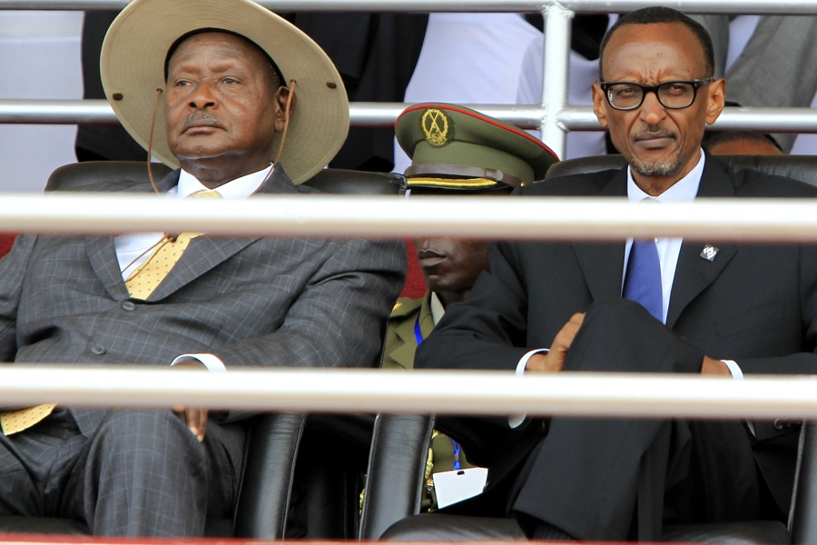 Rwandan President Paul Kagame (R) and his Ugandan counterpart Yoweri Museveni follow the proceedings of the 20th anniversary commemoration of the Rwandan genocide, in Kigali, Rwanda, on April 7, 2014.