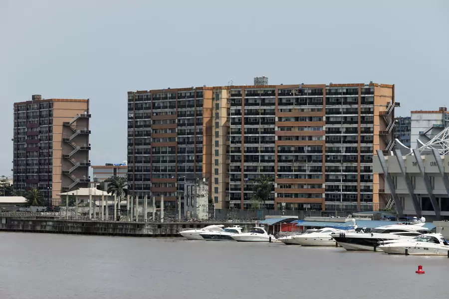 Yachts seen docked at the marina in front of housing complex building in Lagos, Nigeria, on September 23, 2019.