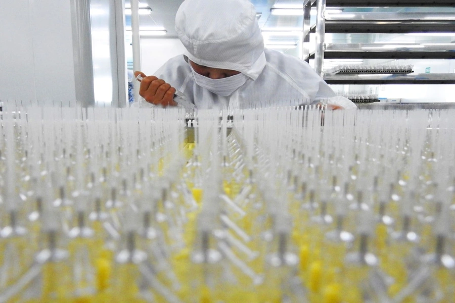 A worker is seen in the workshop of a factory manufacturing medical devices in Lianyungang, China July 27, 2018.