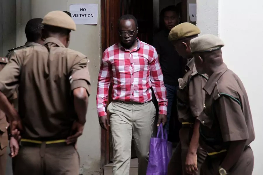 Tanzanian investigative journalist Erick Kabendera arrives at the Kisutu Residents Magistrate Court in Dar es Salaam, Tanzania, on August 19, 2019. 