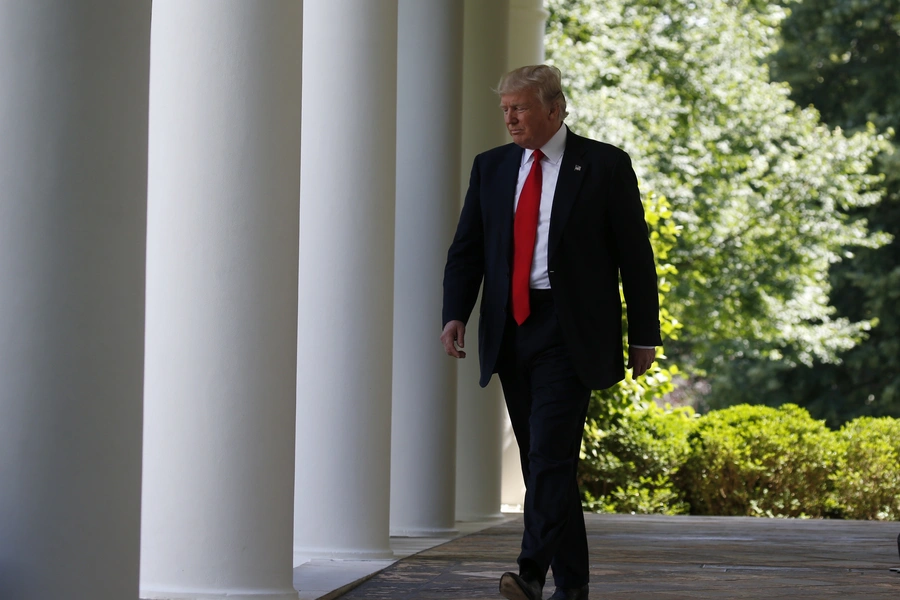 U.S. President Donald J. Trump arrives to announce his decision that the United States will withdraw from the Paris Climate Agreement, in the Rose Garden of the White House in Washington, DC, on June 1, 2017.