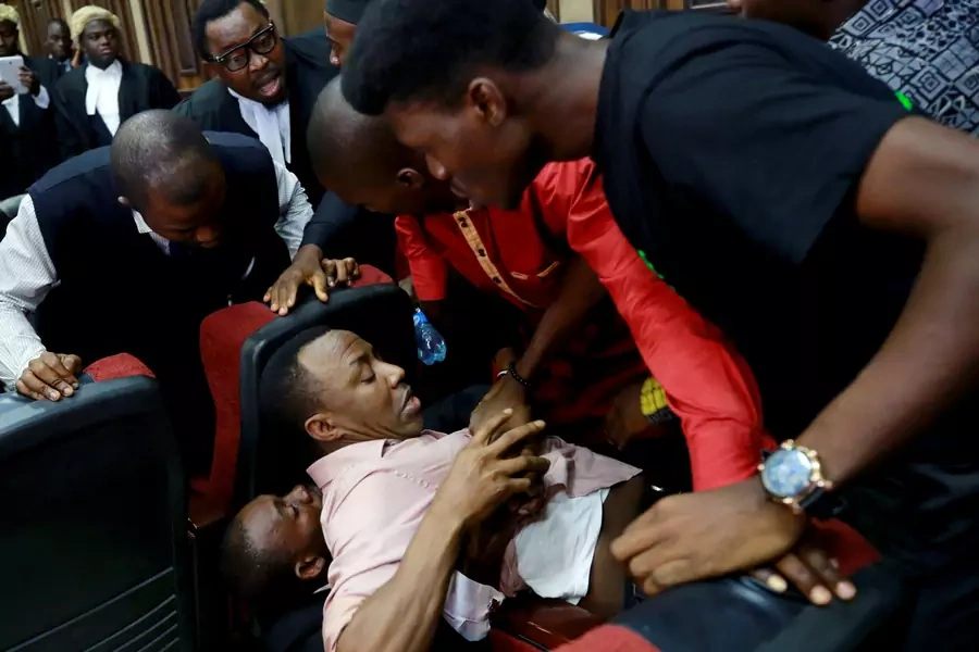 A fight breaks out as security personnel attempt to re-arrest Nigerian activist Omoyele Sowore at the Federal High Court in Abuja, Nigeria, on December 6, 2019.