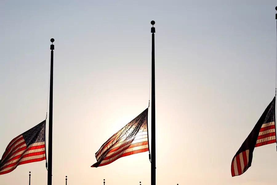 Flags fly at half-staff at the Washington Monument in Washington, DC. Joshua Roberts/REUTERS