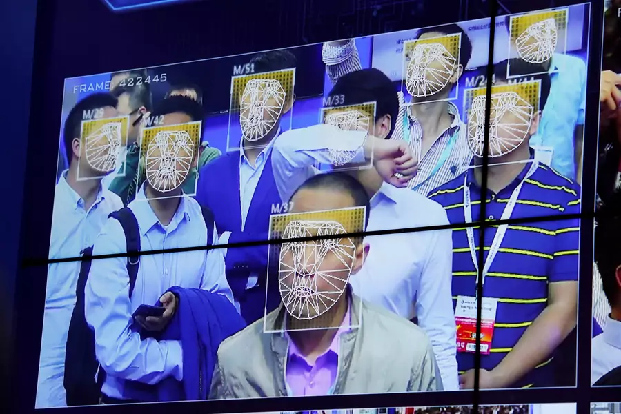 Visitors experience facial recognition technology at Face++ booth during the China Public Security Expo in Shenzhen, China.