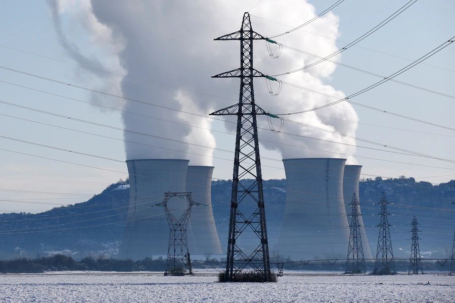 Pylons of high-tension electricity power lines are seen near the Bugey Nuclear Power Plant after heavy snowfall in Saint -Vulbas, France