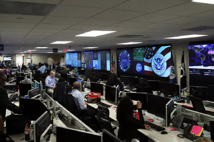U.S. Department of Homeland Security (DHS) election security workers monitor screens in the DHS National Cybersecurity and Communications Integration Center in Arlington, Virginia, on November 6, 2018. 