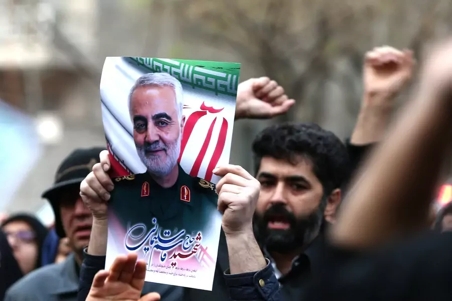 Demonstrators hold a picture of Qasem Soleimani as they protest his assassination by the United States in Tehran, Iran, on January 3. 