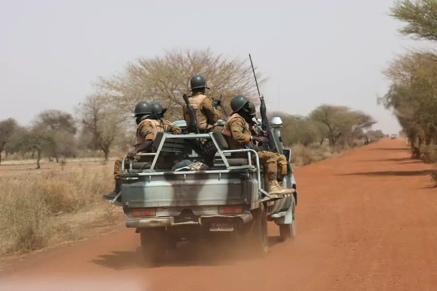 Soldiers from Burkina Faso patrol on the road of Gorgadji in Sahel area, Burkina Faso, on March 3, 2019.