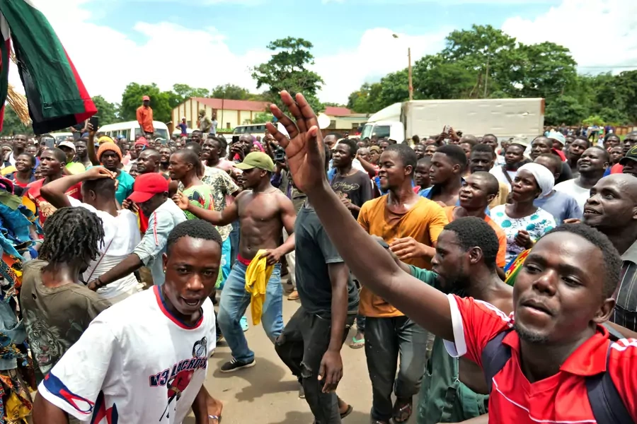 Opposition supporters celebrate after the country's constitutional court annulled the May 2019 presidential vote that declared Peter Mutharika a winner, in Lilongwe, Malawi February 4, 2020