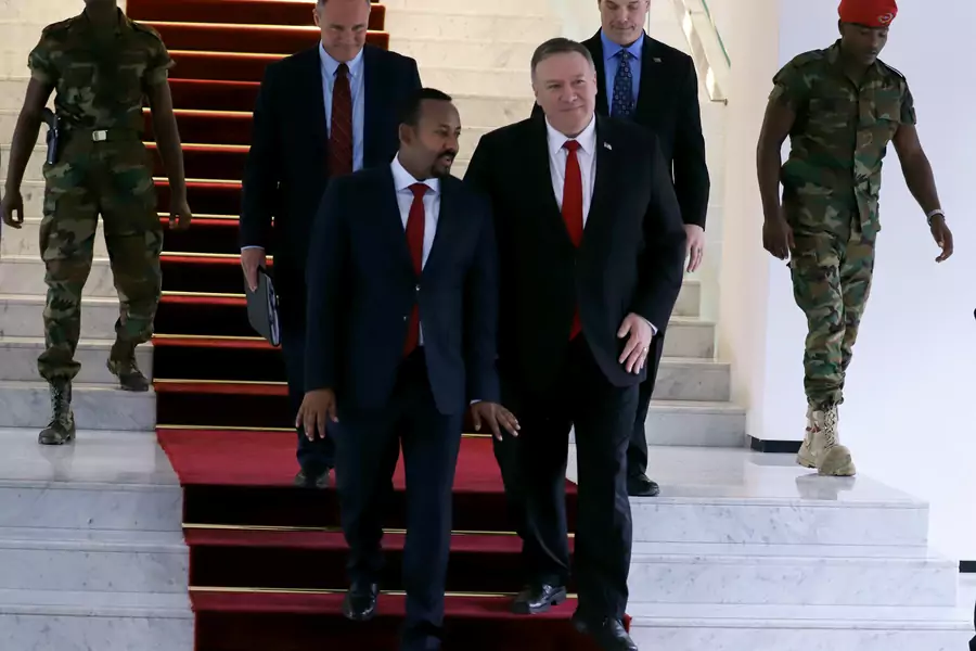 U.S. Secretary of State Mike Pompeo walks with Ethiopian Prime Minister Abiy Ahmed at the Prime Minister office after a meeting in Addis Ababa, Ethiopia, on February 18, 2020.