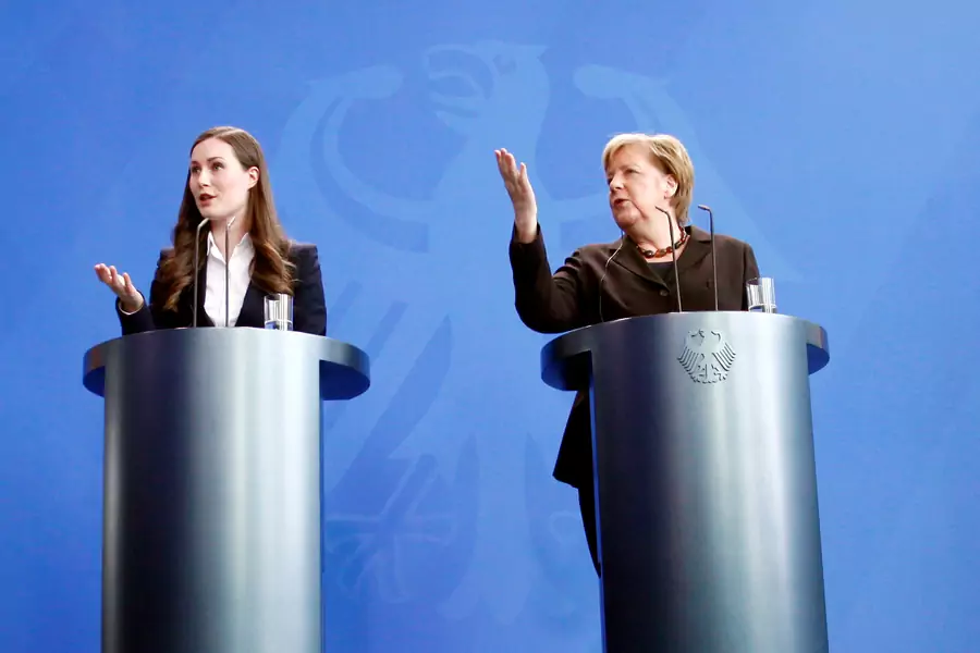 Finland's Prime Minister Sanna Marin and Germany's Chancellor Angela Merkel at a news conference in Berlin, Germany. February 19, 2020.