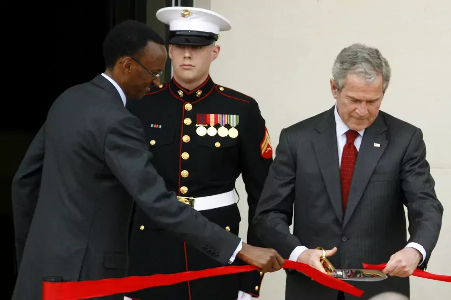 U.S. President George W. Bush and his Rwandan counterpart Paul Kagame cut a ribbon to officially open the U.S. Embassy in the capital of Kigali, on February 19, 2008.