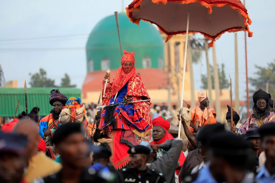 Muhammad Lamido Sanusi II, then the emir of Kano, rides on a dressed camel during the Durbar festival, on the second day of Eid al-Adha celebration in Nigeria's northern city of Kano, on September 2, 2017.