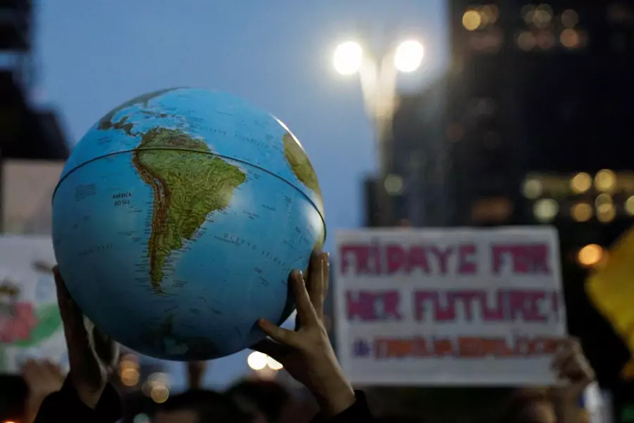 A person holds a globe during the Global Climate Strike of the Fridays for Future movement in Sao Paulo, Brazil, on September 20, 2019. 