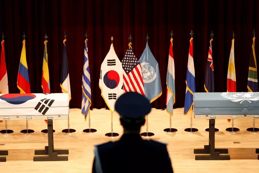 A South Korean honor guard stands in front of boxes containing the remains of the UNC and ROK soldiers killed in North Korea in the 1950-53 Korean War during the mutual repatriation ceremony of soldiers' remains in Seoul, South Korea on July 13, 2018.