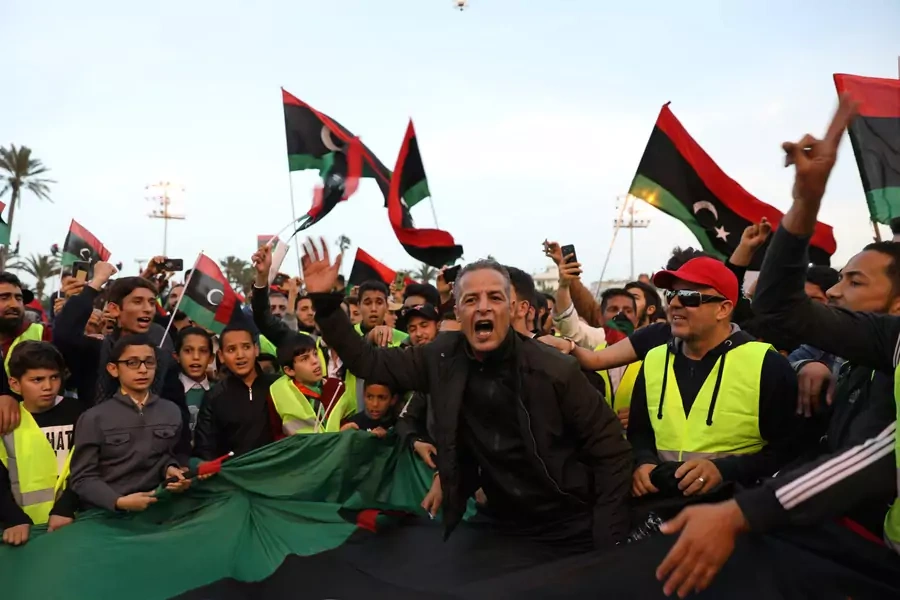Libyan protesters demand an end to General Khalifa Haftar's offensive against Tripoli, Libya, in April 2019. 
