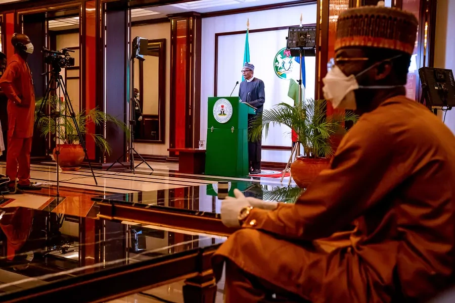 Nigerian President Muhammadu Buhari addresses the nation on the coronavirus disease (COVID-19), in Abuja, Nigeria March 29, 2020. 